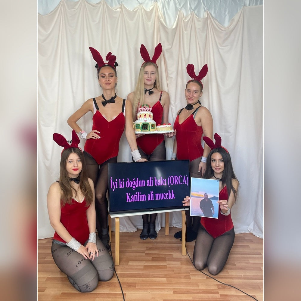 Ukrainian girls in red bunny outfits creating a personalized birthday video